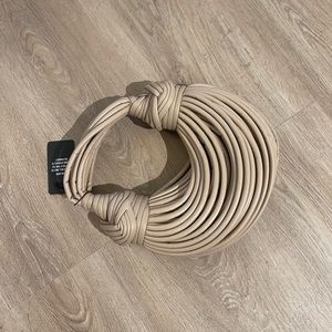 Tan purse from EGO. Brand new. Tags still on it.